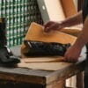 Boot being wrapped in paper